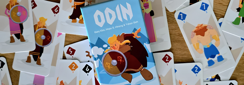 A deck of cards is spread out, featuring cartoon Viking characters in various colors and action poses. A card in the center is titled "ODIN."